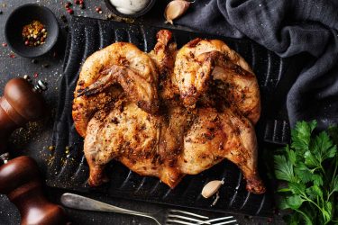baked-chicken-tabaka-with-spices-5DU7A3P.jpg